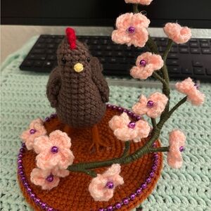 Handcrafted Crochet Bird with Floral Accent Gallito a crochet